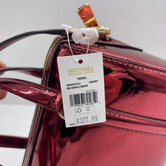 MICHAEL KORS Jet Set Sm Metallic Convertible Crossbody Duffle XBODY
Cherry
NWT - Picture 9 of 16